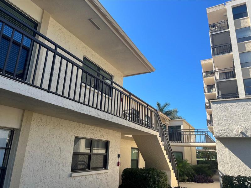 Front of Building - parking space is on same level with no steps to or in condo