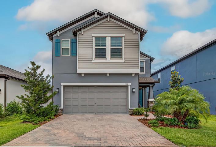 This move-in ready 2022 new construction home shows like a model!