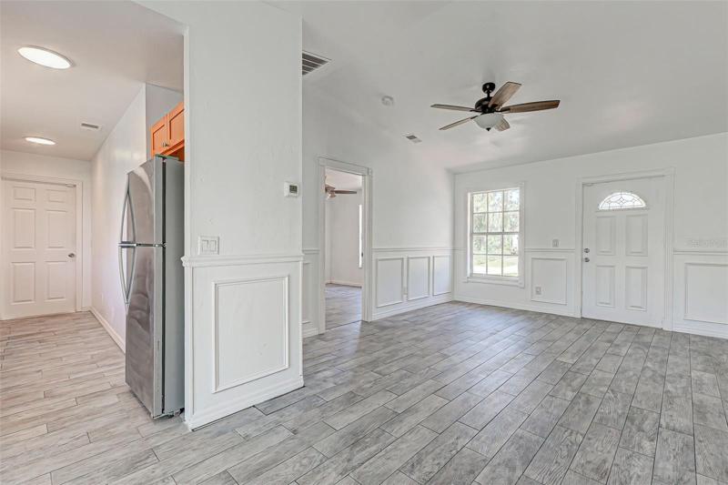 Living Room with doors to Master Bedroom and Kitchen