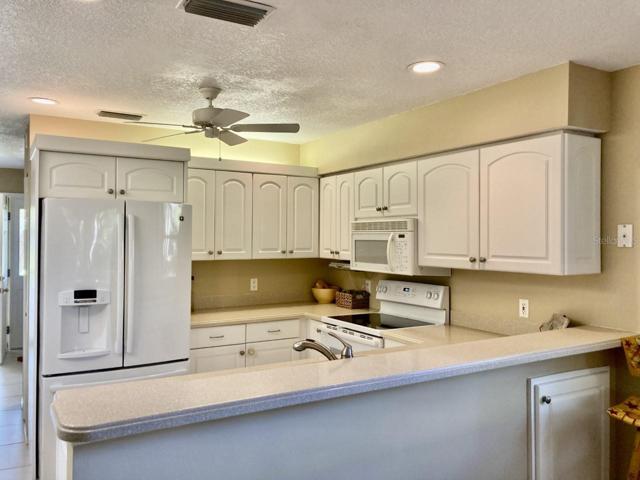 Recessed lighting in kitchen.