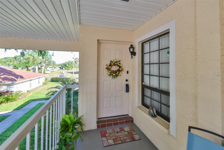 Second story condo with a front porch and open feel.