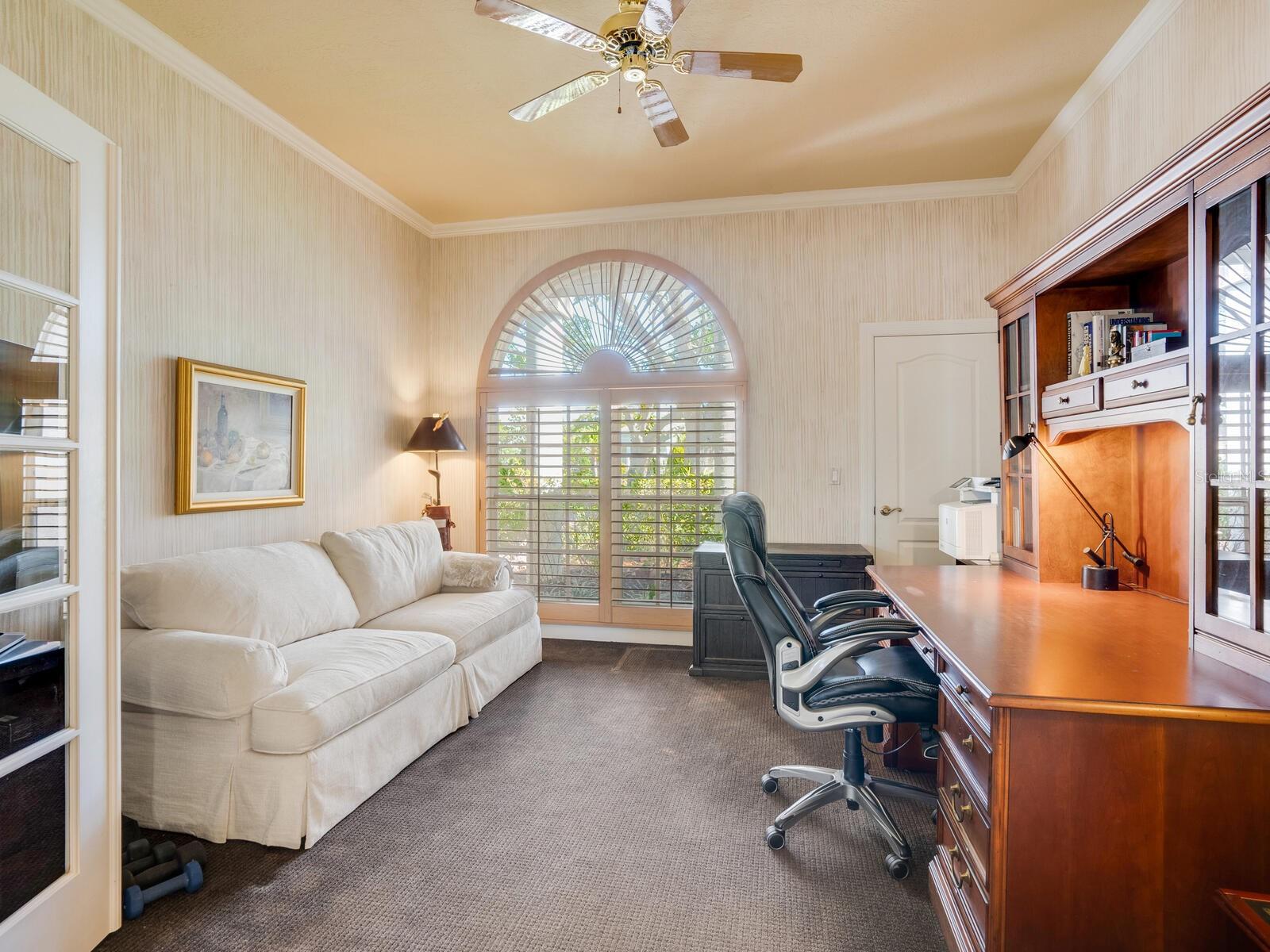 The office/den offers double glass doors and has a walk-in closet.  Can be used as a 4th bedroom.