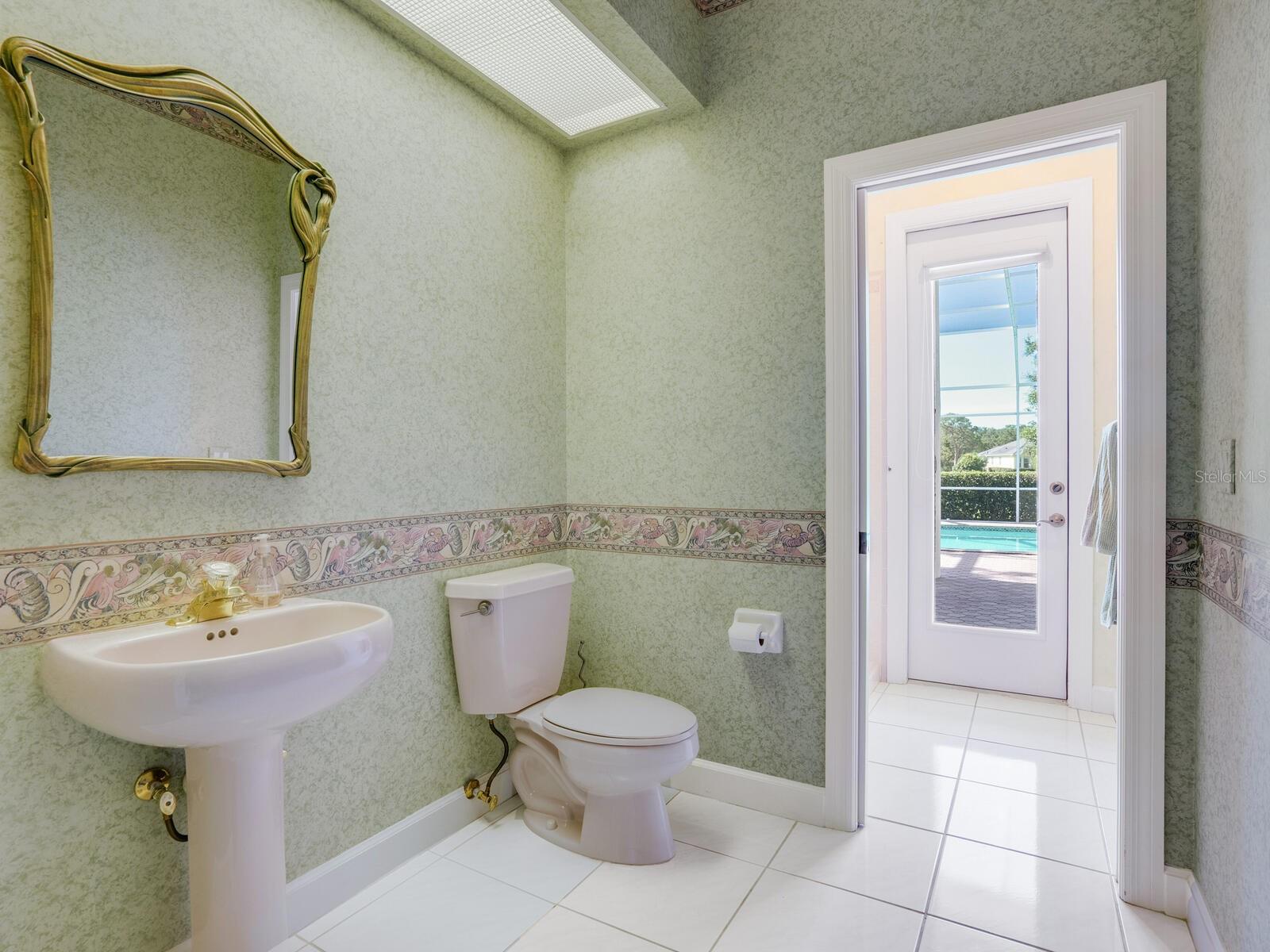 The powder room doubles as a pool bath.