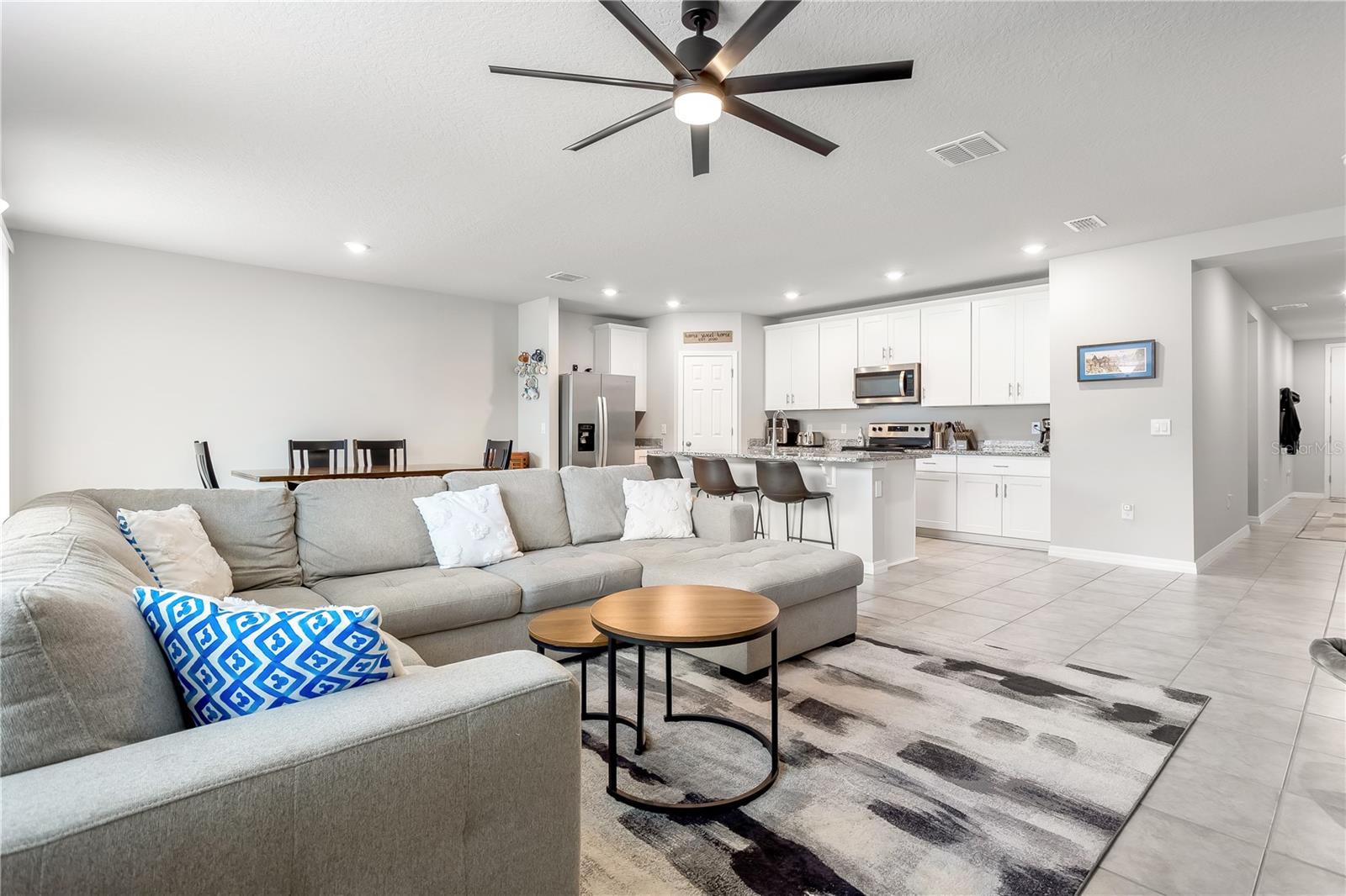 Alternate view of open floor plan from living room corner