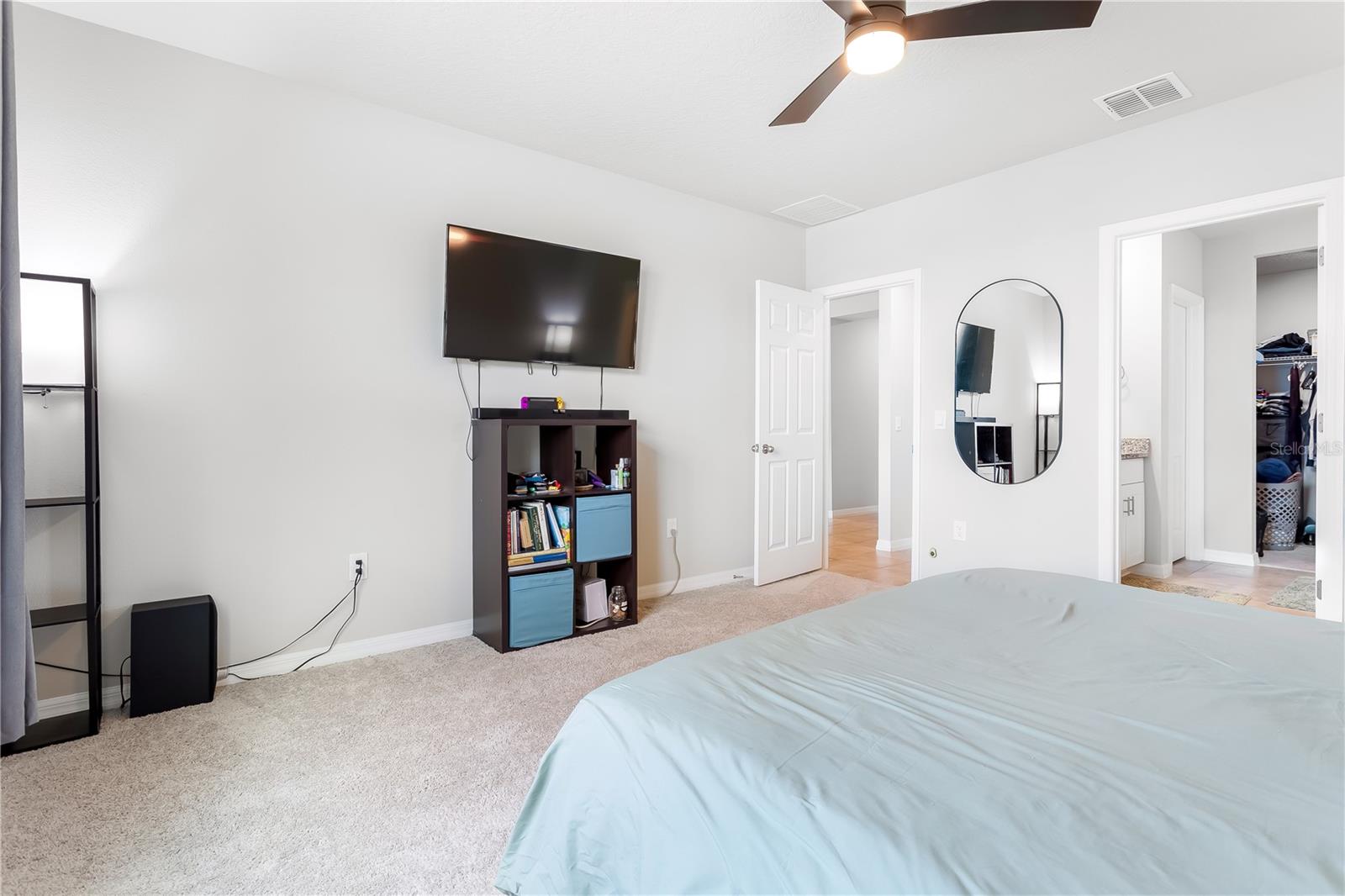 Primary bedroom with primary bathroom