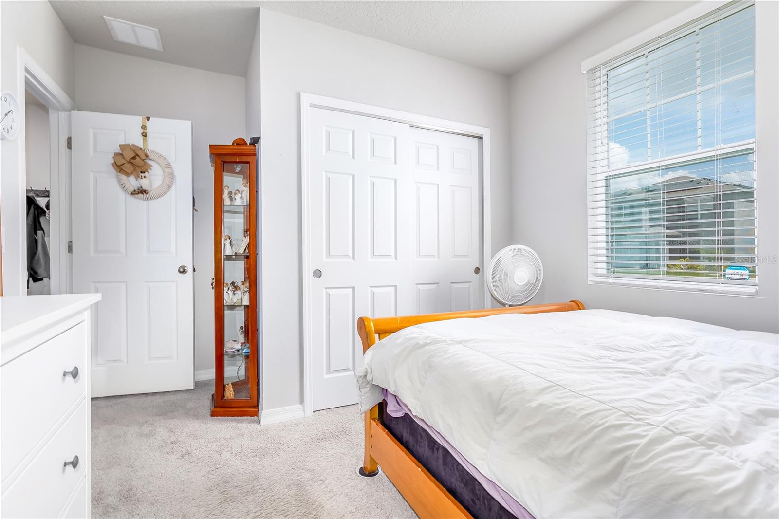 Guest bedroom 1, alternate view with closet.