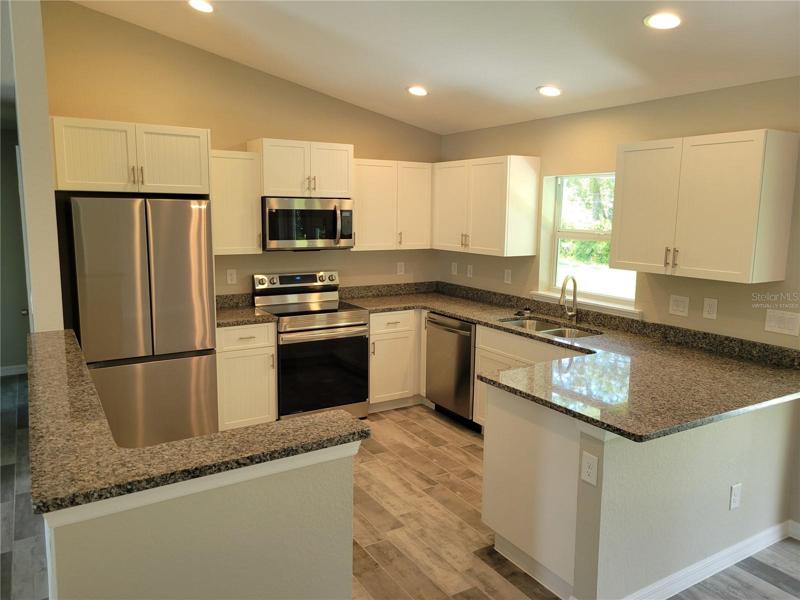 Virtually staged, this is a photo of a previous home of the same model built by the same builder. Features subject to change, buyer to verify.