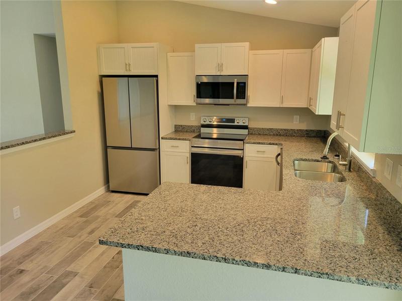 Virtually staged, this is a photo of a previous home of the same model built by the same builder. Features subject to change, buyer to verify.