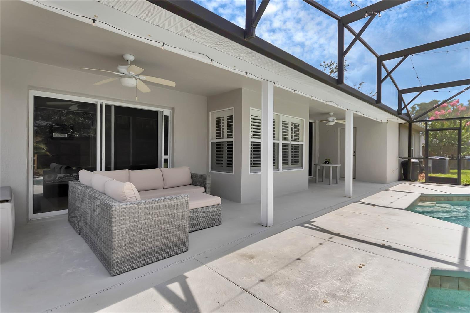 covered patio can be accessed from master bedroom, family room and 3rd full bath