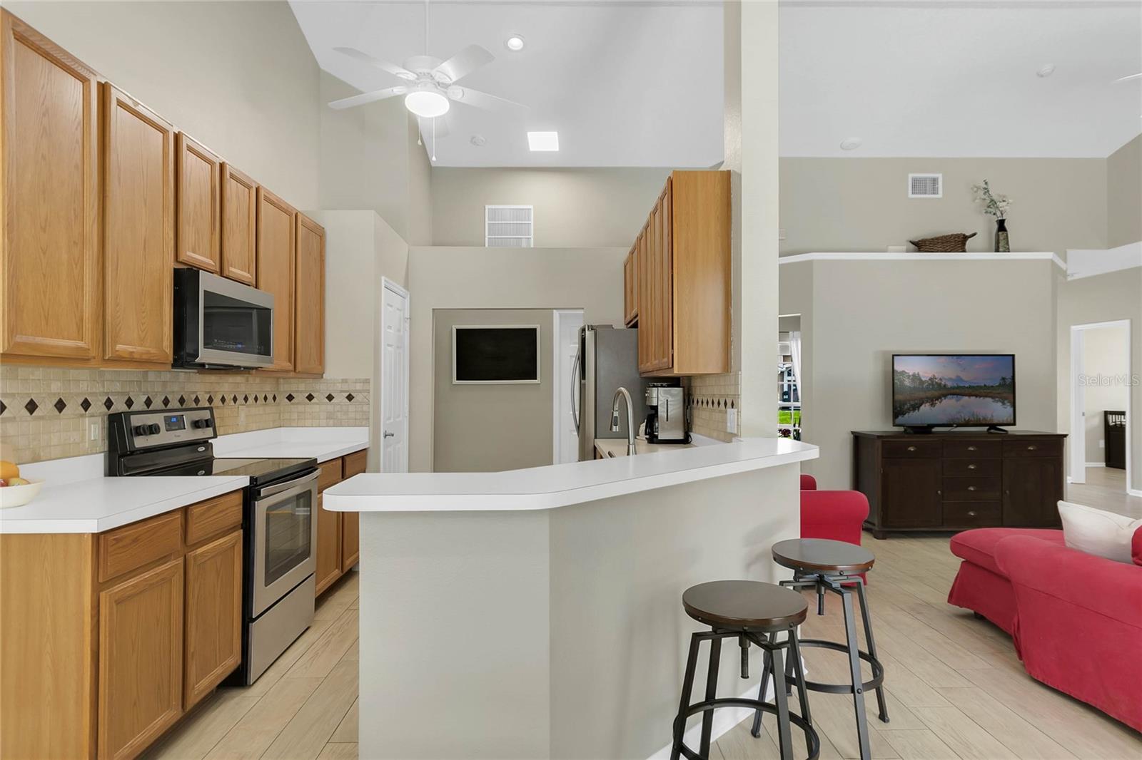 Additional counter seating, closet pantry in kitchen