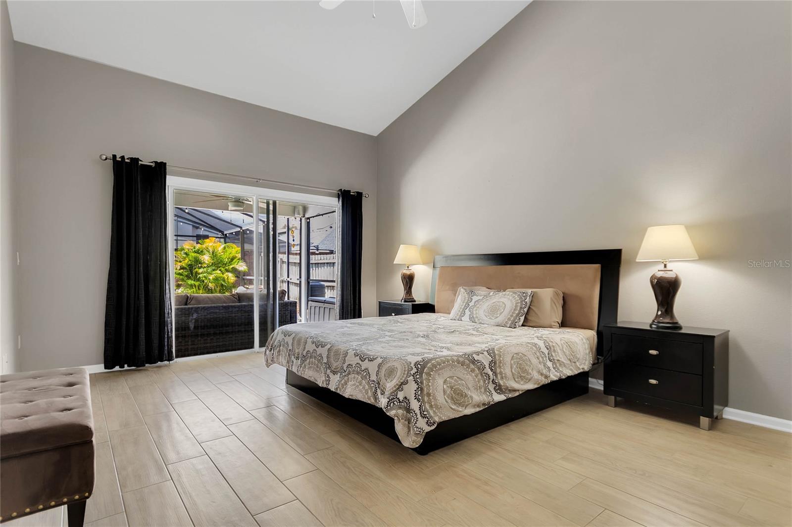 Master bedroom, vaulted ceiling, sliders to patio/pool, en-suite with WIC