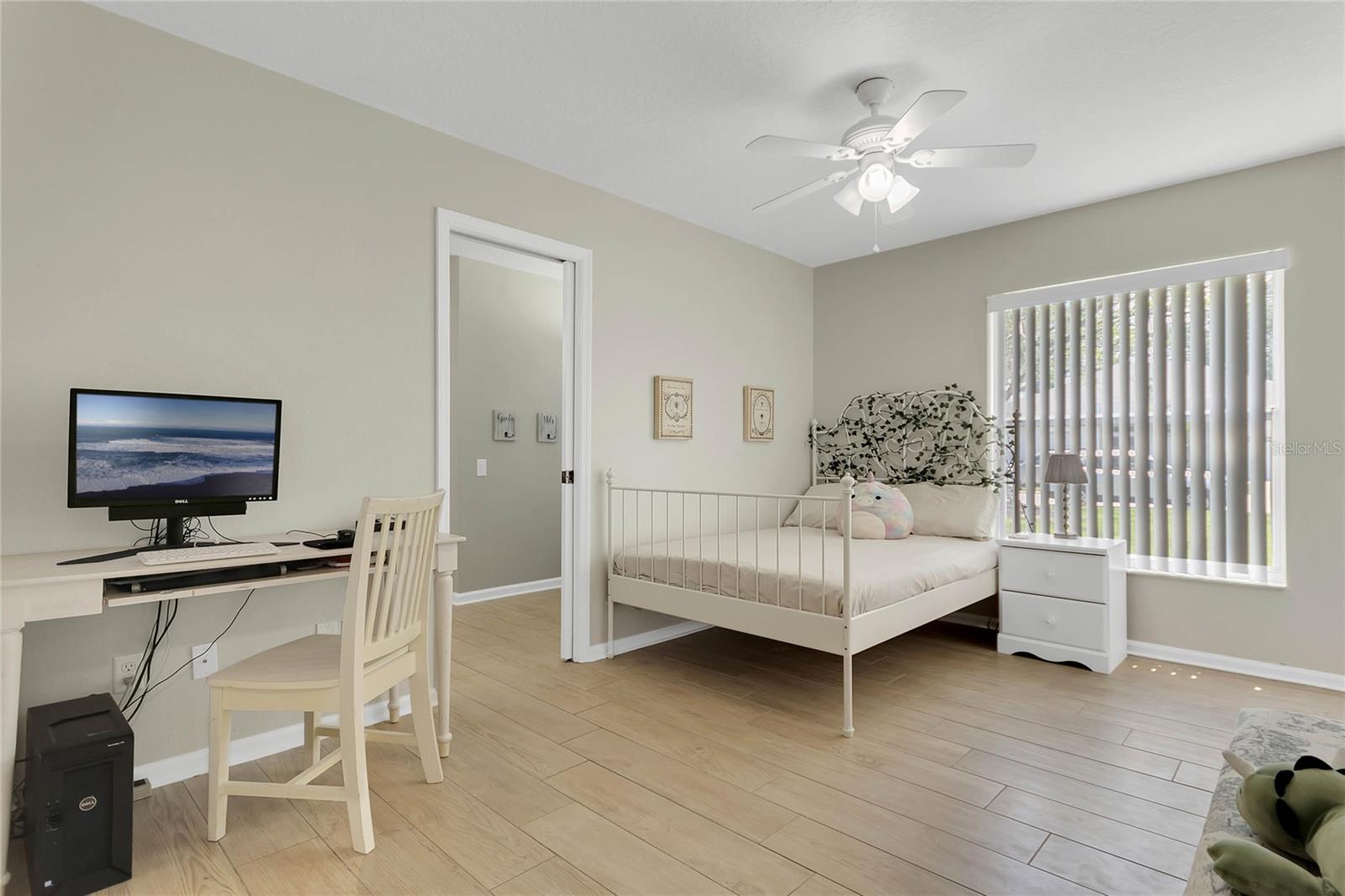 One of 2 bedrooms sharing a jack and Jill bath, this bedroom has 2 separate closets