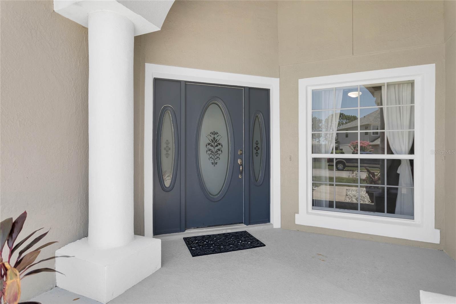 Welcoming front covered entrance