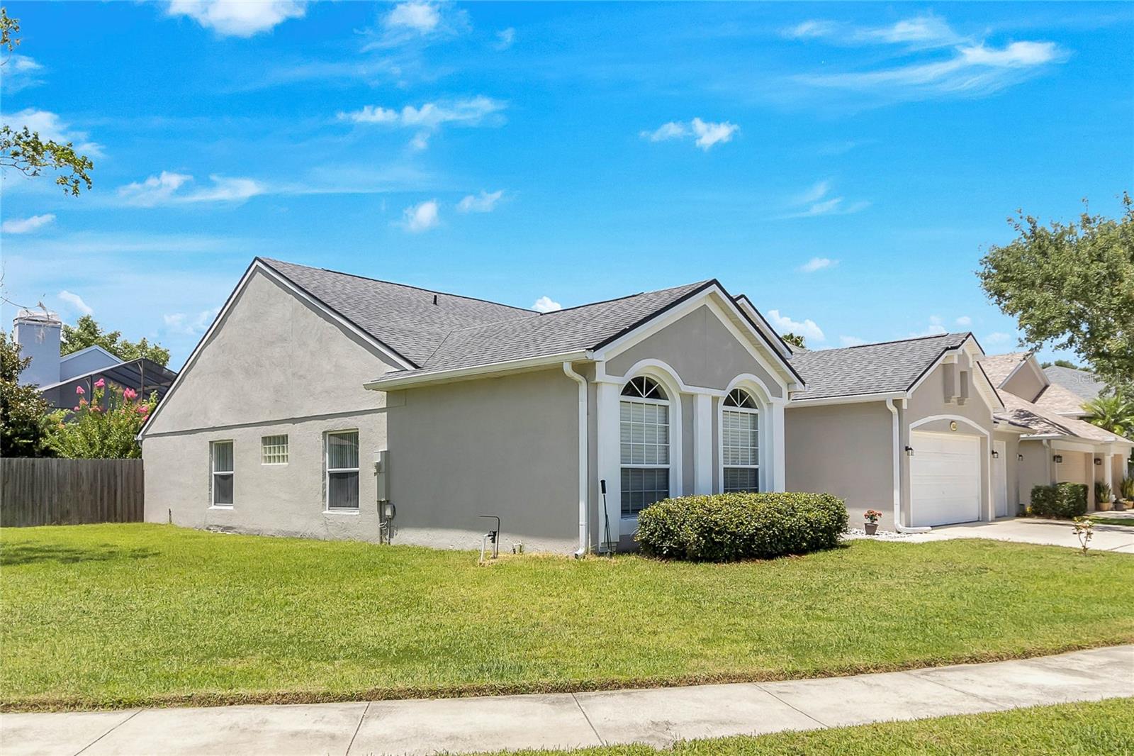 Corner lot has  additional side property outside of pool fence
