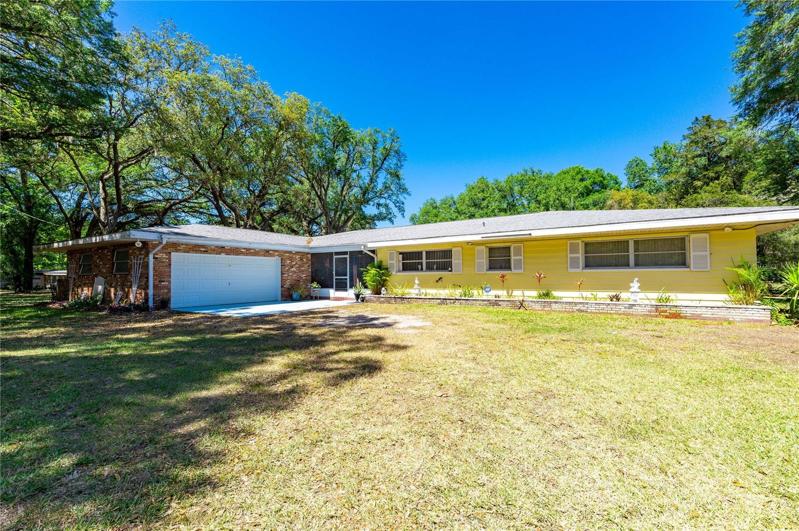Main home has updated roof, five bedrooms, three bath, two car garage, pool, and many more updates.
