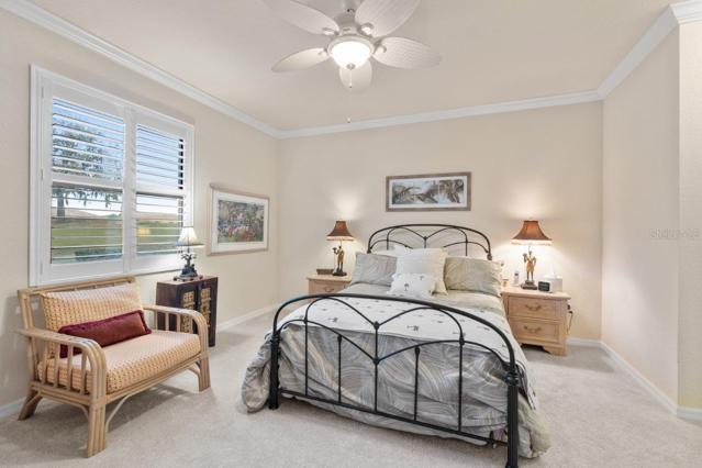 Down stairs Owners Suite located off the living room with Golf course views
