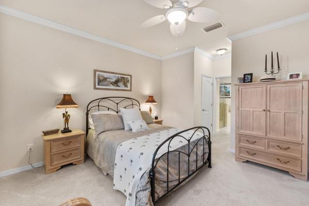 Down stairs Owners Suite located off the living room with Golf course views