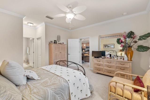 Down stairs Owners Suite located off the living room with Golf course views