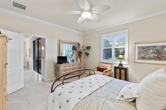 Down stairs Owners Suite located off the living room with Golf course views