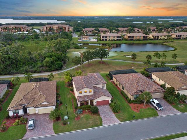 Aerial of the front elevation and golf course views