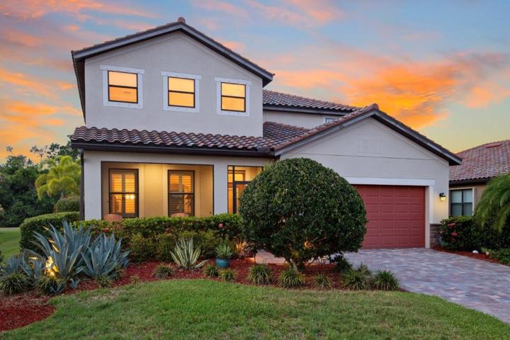 Front Elevation featuring landscape and pathway lighting
