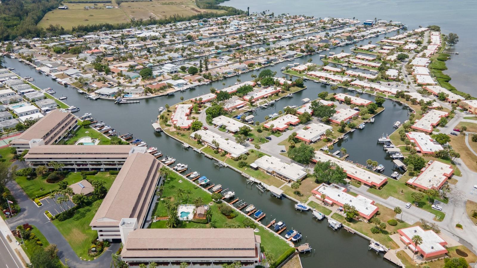 WATERWAY CONDOMINIUMS - LUXURY WATERFRONT COMMUNITY- heated pool, huge spa pool, tennis, Fitness Center, Billiards Room, Library/Table Tennis Room, Craft Room with power equipment, Clubhouse and beautifully manicured lushly landscaped grounds.