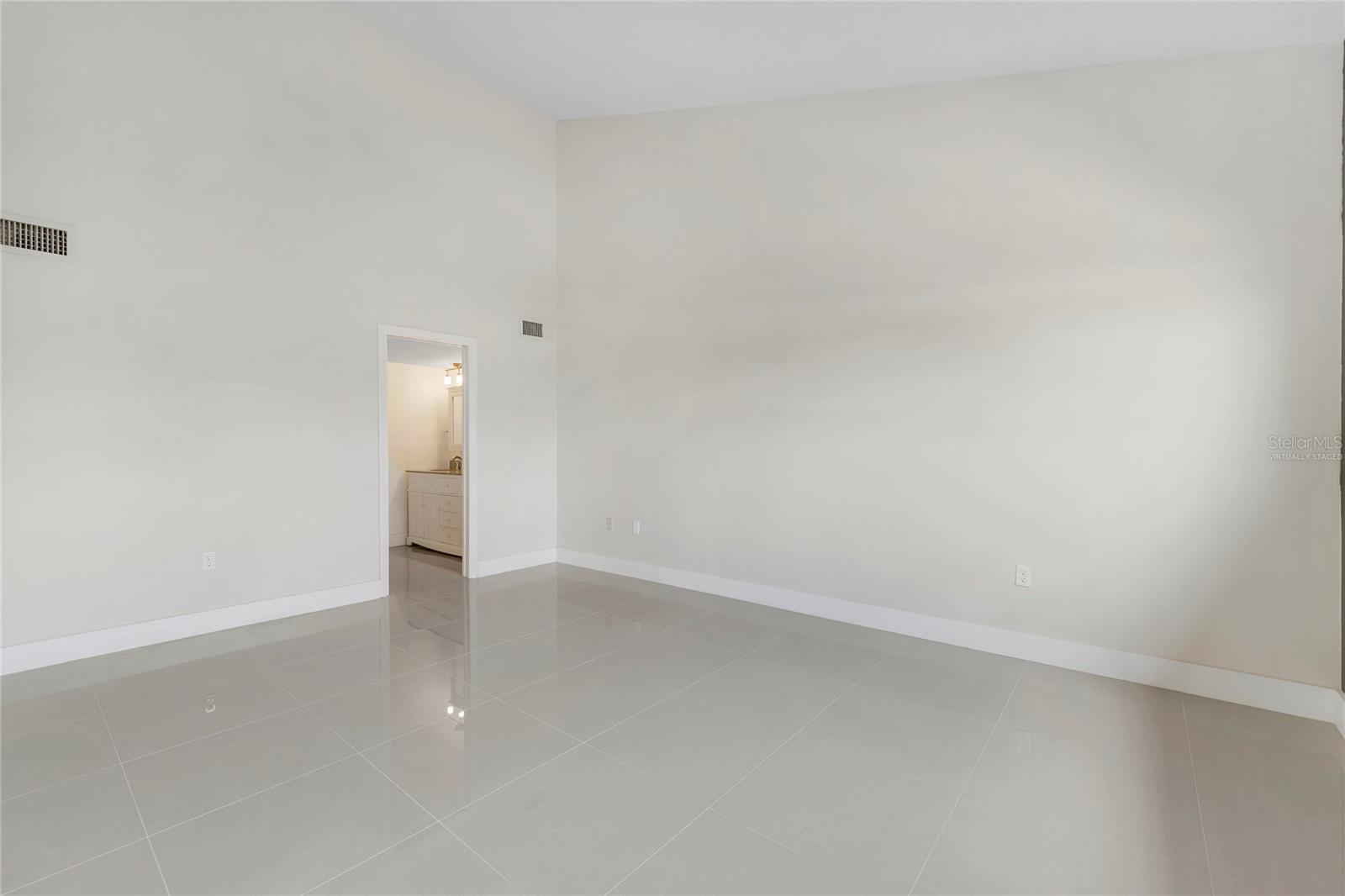 FIRST MASTER BEDROOM - VIRTUALLY STAGED