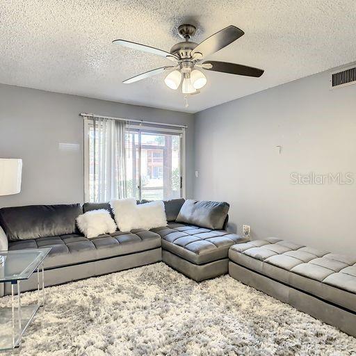 View from Living Room to Screened Patio Area