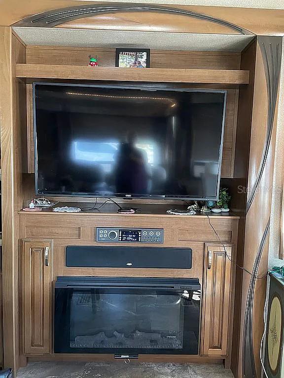 Entertainment center with fireplace