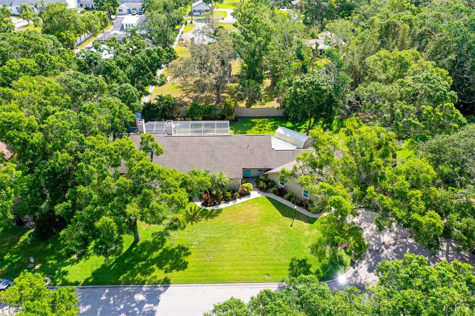 Surrounded  by mature landscaping
