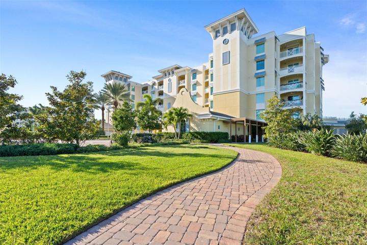 A brick paver walkway surrounds the entire community