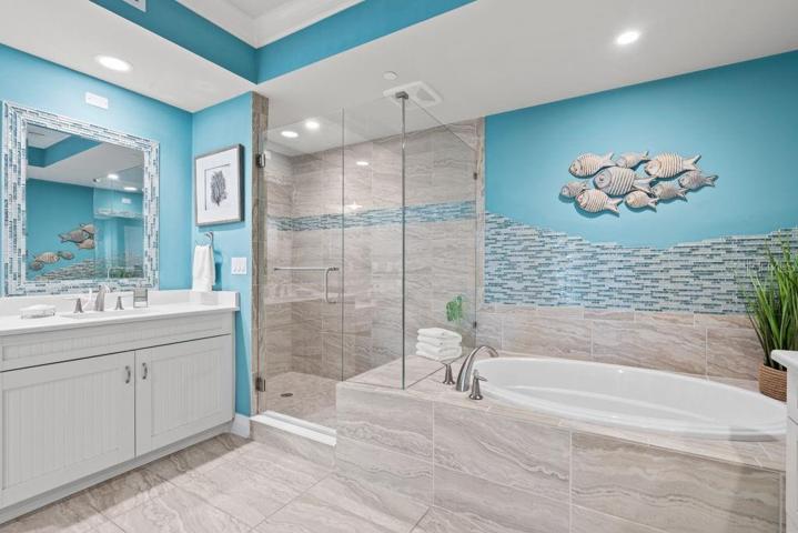 Primary Bathroom with walk-in shower and relaxing soaking tub.