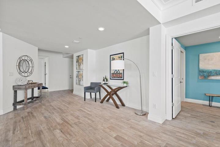 Interior Foyer area coming from the double door private entry.