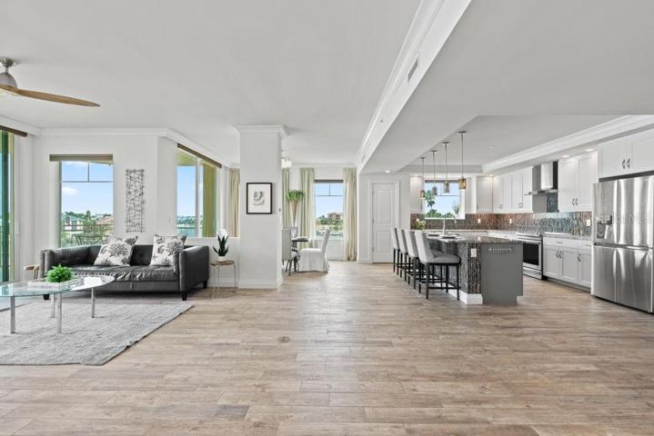 The popular corner unit provides lots of sun and water views!