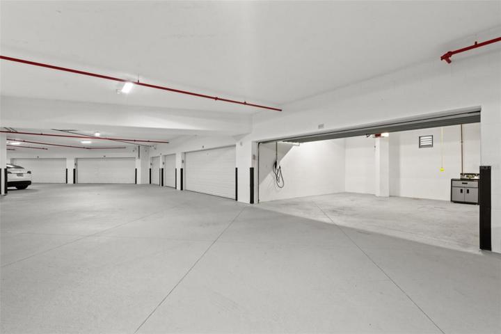 Oversized 2-car garage within the garage with dedicated electricity for electric car charger if needed.