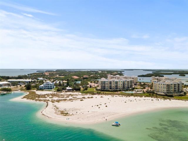 Relax on the private beach with the gorgeous blue water of the Gulf of Mexico!