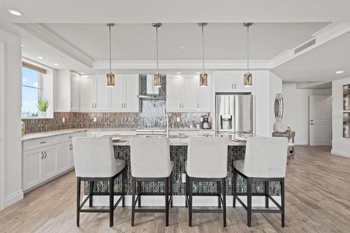 Gather around the kitchen island while cooking your favorite meal.