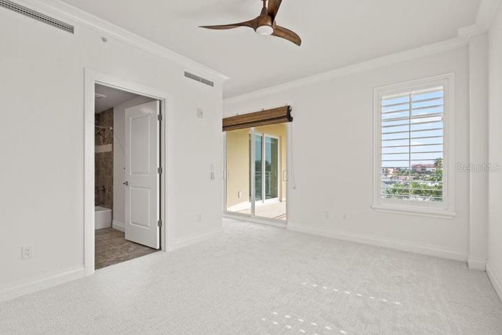 Bedroom #3- En-suite bathroom and balcony access.