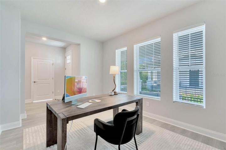 The room is bright with 3 great windows and a pretty view