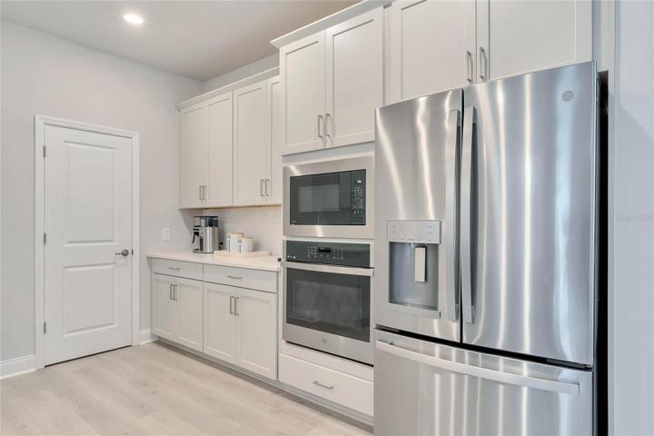 Refrigerator, wall oven and microwave