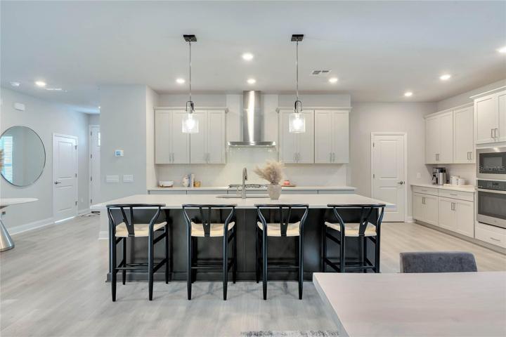 The kitchen has plenty of counter space and storage