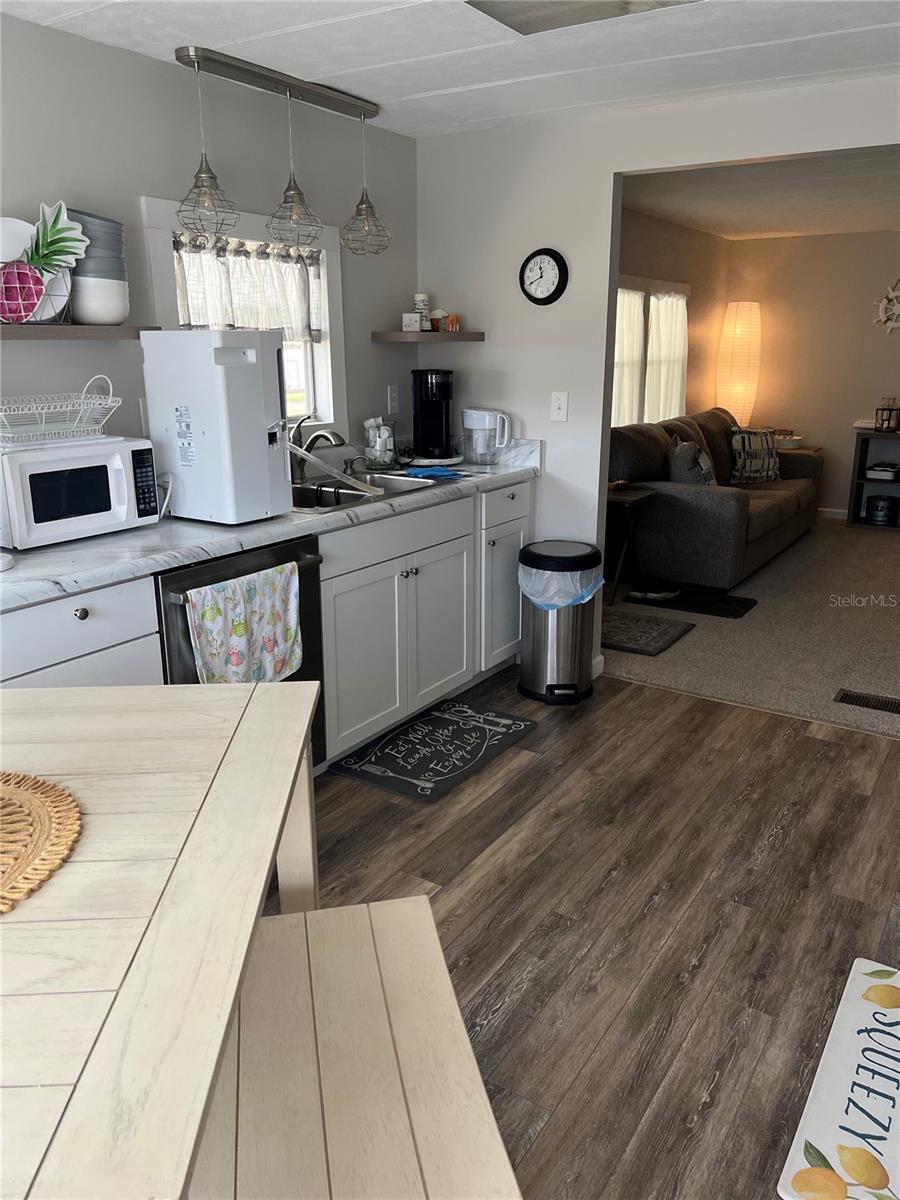 Kitchen looking into living room
