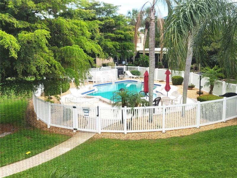 view of the pool from view of pool from balcony