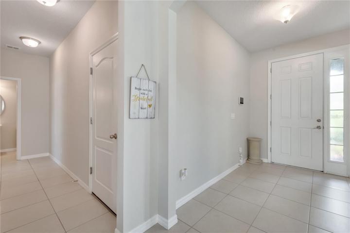 Hall entrance to flex room and half bath