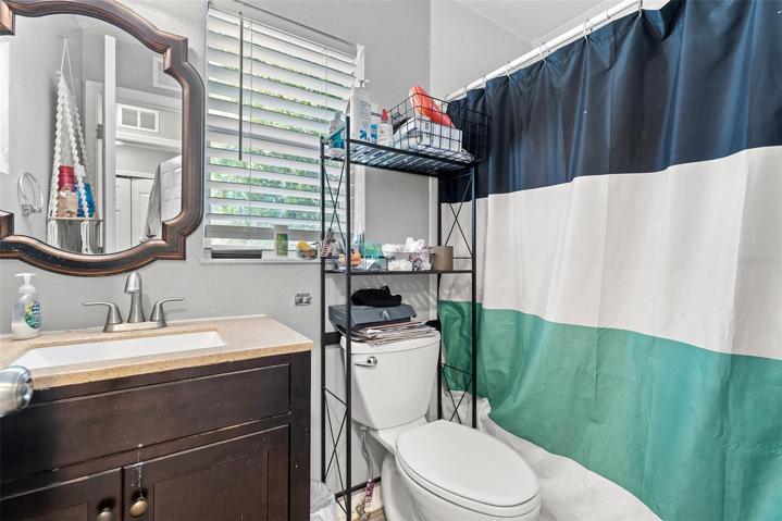 Unit B hallway bathroom