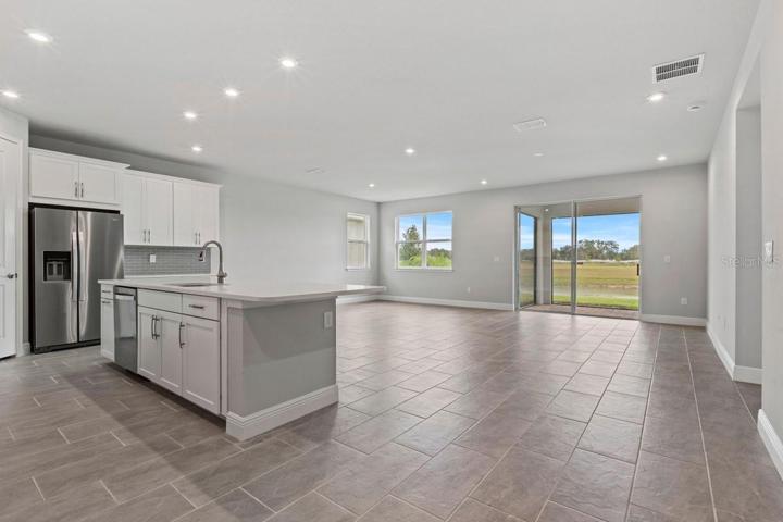 View of Great Room, Dining and Kitchen