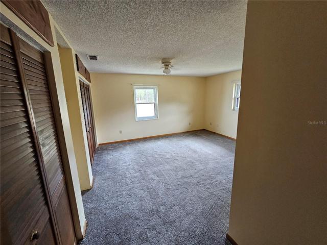 Master bedroom with 2 large closets