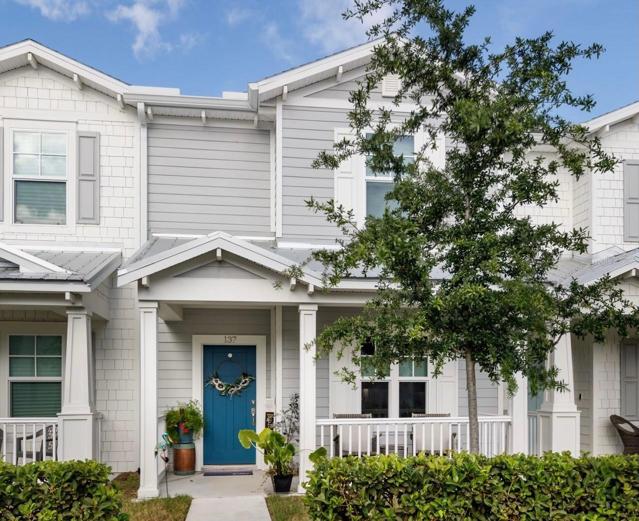 Front on Ring Av. with covered porch