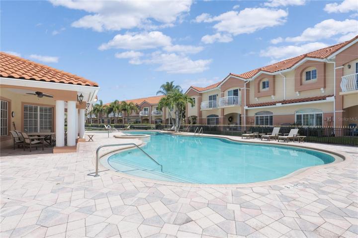 Pool area behind the home
