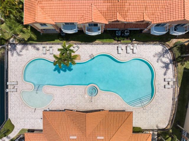 Pool area behind the home